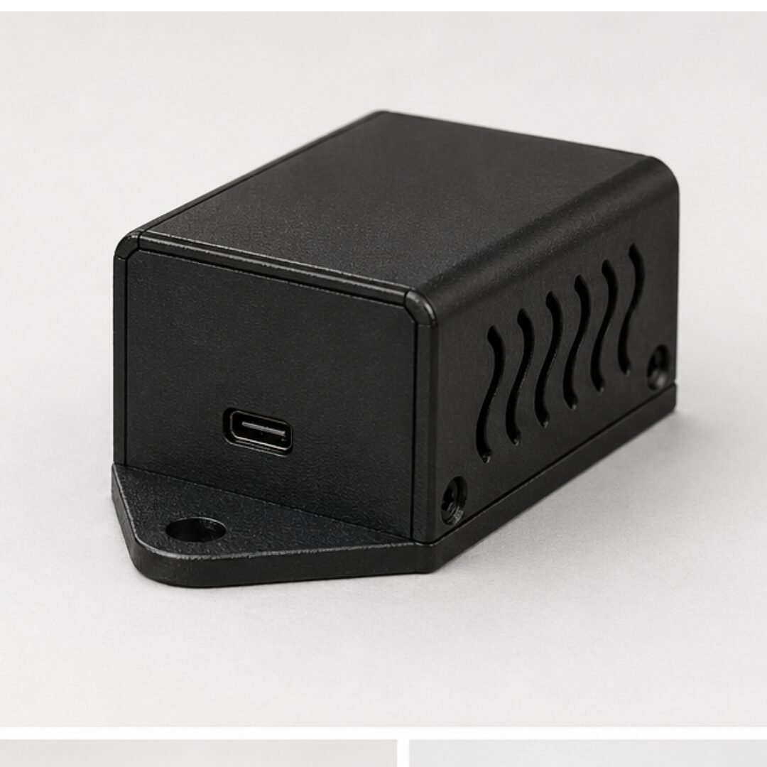 New Project (37) Compact matte black project box featuring side ventilation, USB-C port, and secure flange mounting points. - Image 1